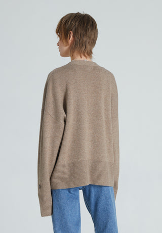 Back of a brown cashmere cardigan with long sleeves and relaxed fit. 